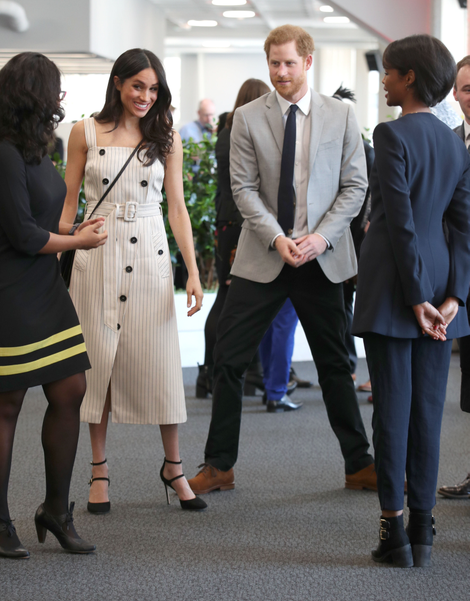 Prince Harry and Meghan Markle speak with delegates from the Commonwealth Youth Forum.